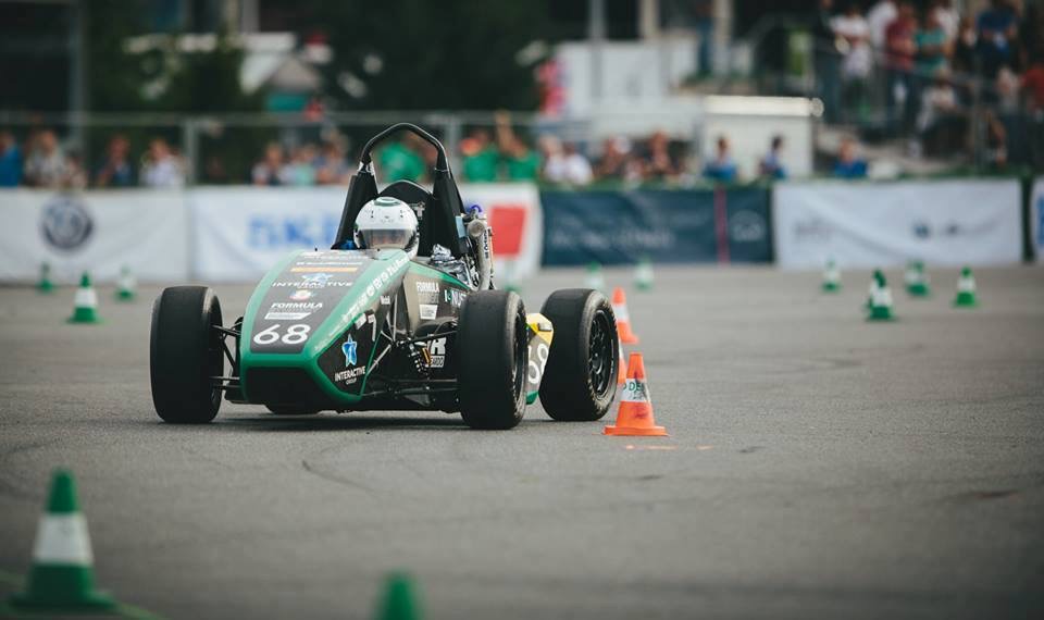 NUST Formula Student car cornering at the 2015 event